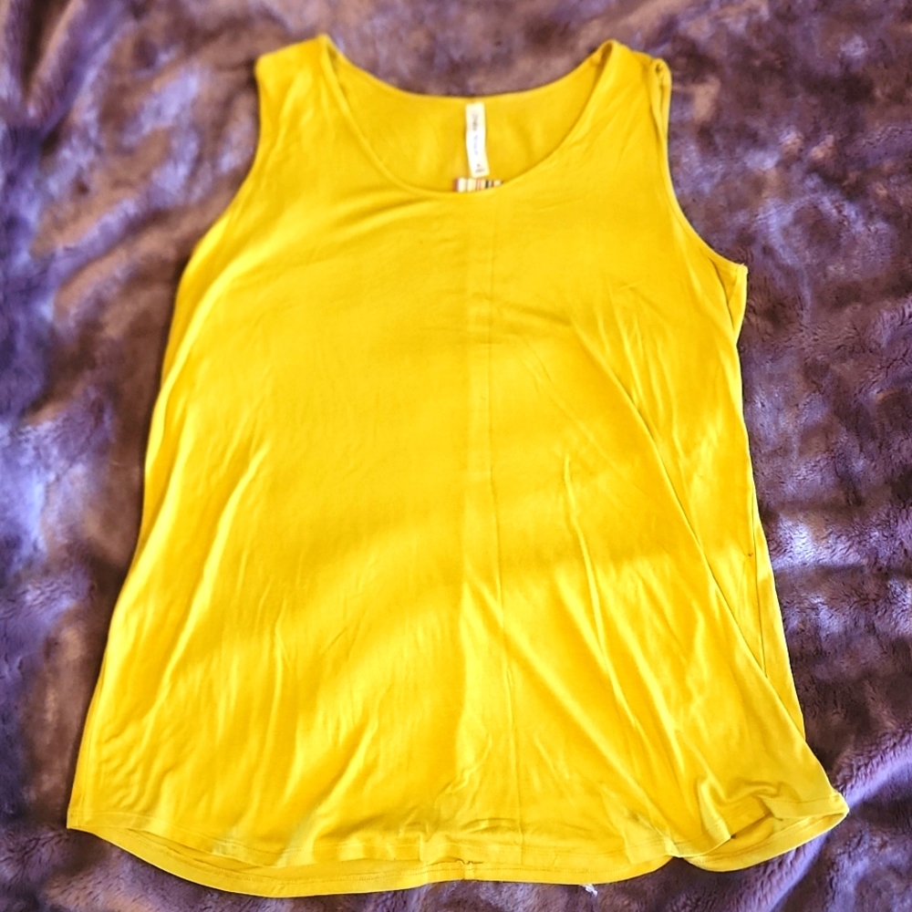 New tank top with tags intact.